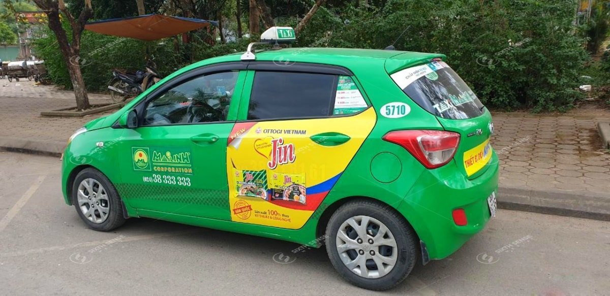 quảng cáo trên xe taxi tại hà nội